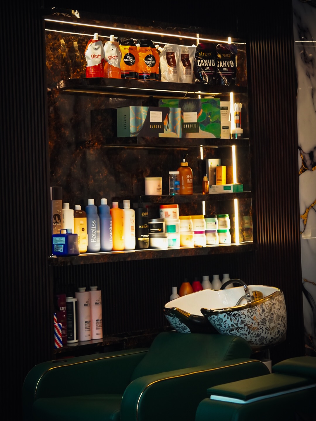 Premium professional hair care products display at Music Salon Mandi showing SHEA and other luxury brands