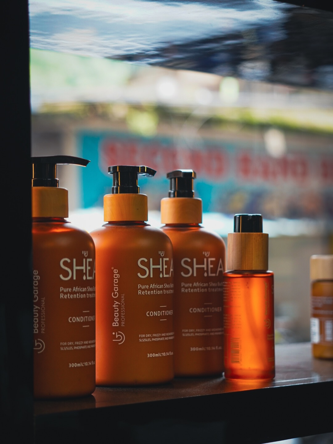 Premium SHEA hair care products display showing professional salon quality treatments at Music Salon Mandi